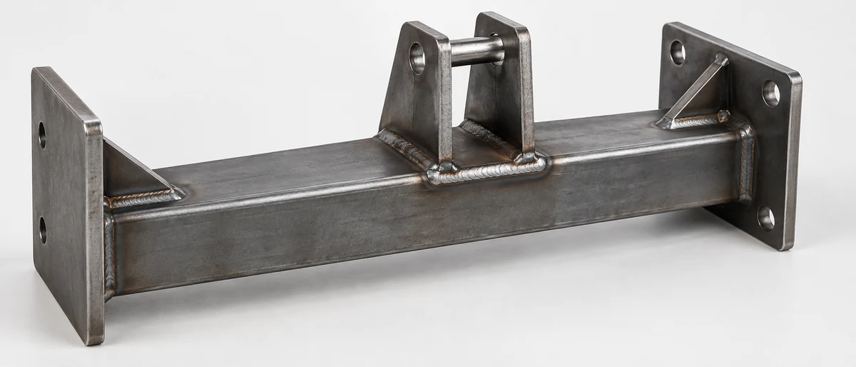 Welded steel bracket assembly with joints