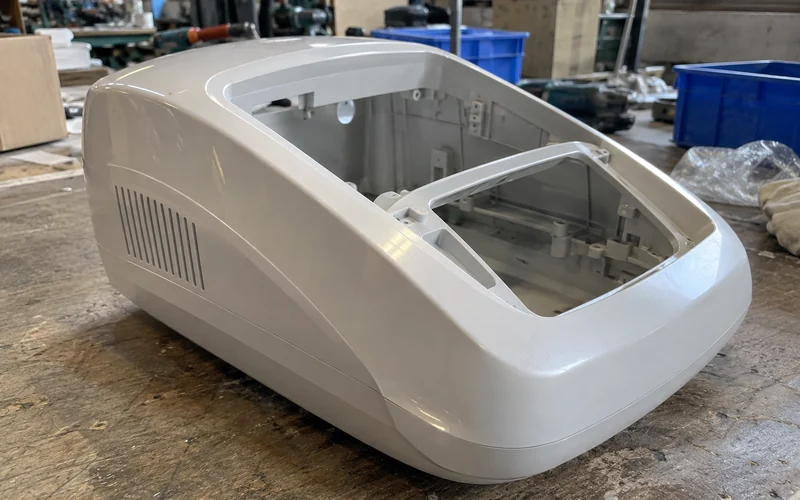 A cosmetic injection molded housing